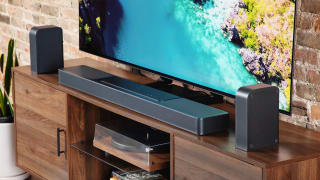 The JBL Bar 1300X on a TV console.