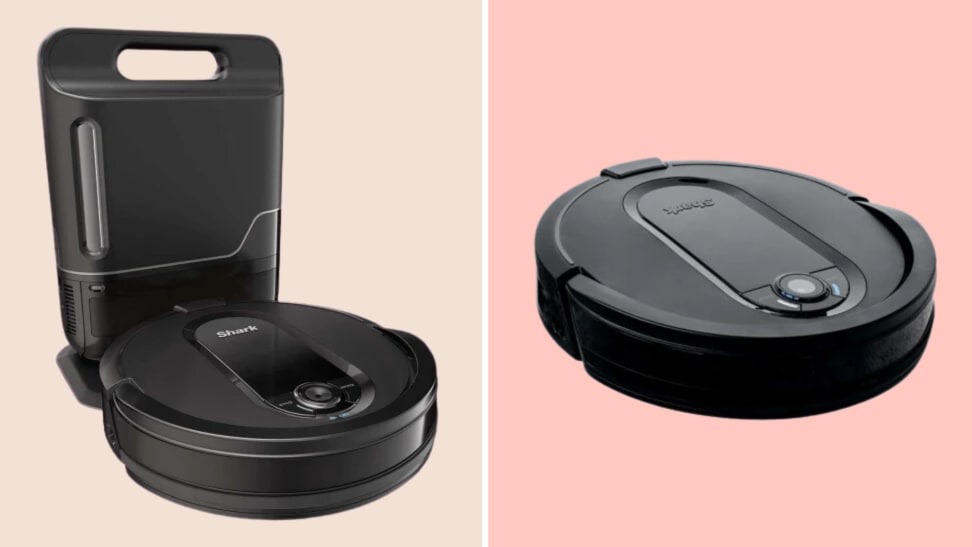 The Shark RV1001AE IQ Robot in black on a pink background.