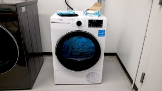 A white ventless dryer sits next to a larger dryer in the Reviewed lab.