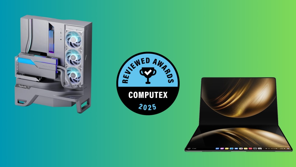 A desktop computer and a laptop sit on a green background with a round blue award badge in the center