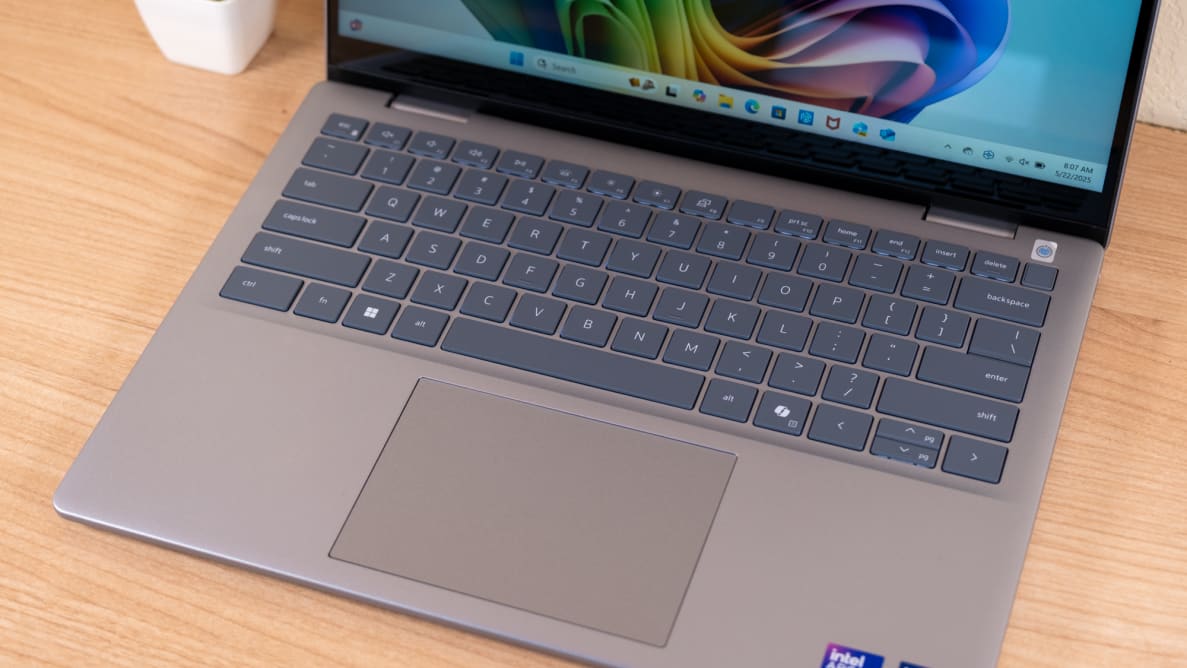 A close up of a laptop's trackpad and keyboard
