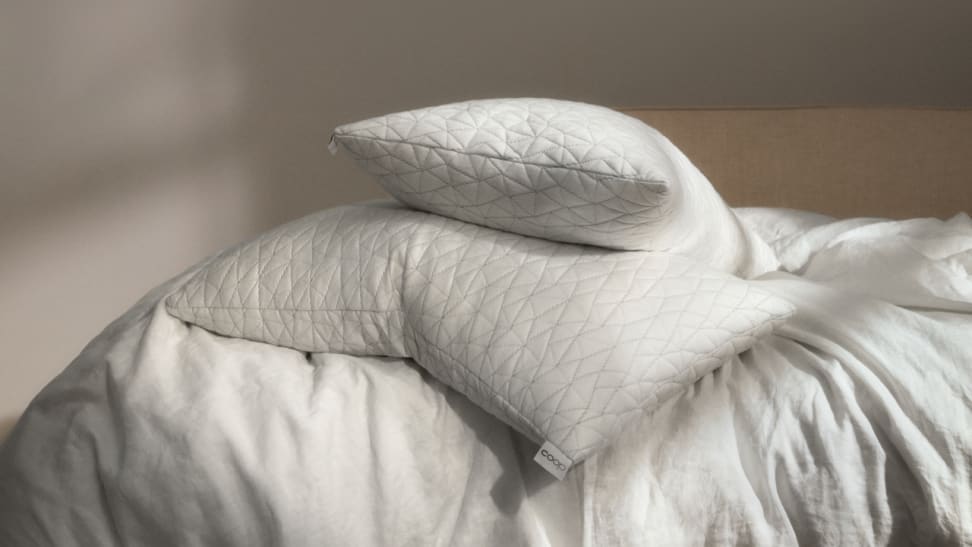 Coop Home original pillows sit on top of a bed